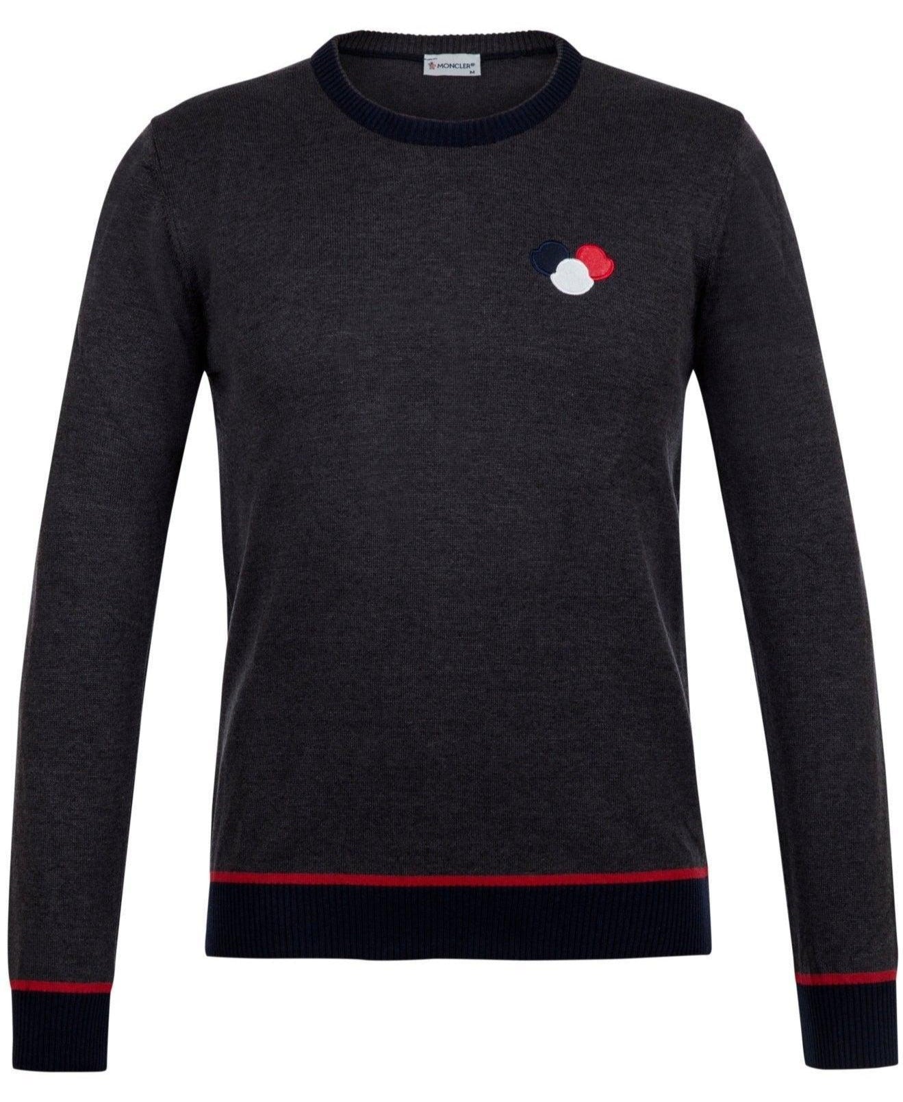 Dark gray Moncler sweater with round neck, red and navy trim, and tri-color logo on chest